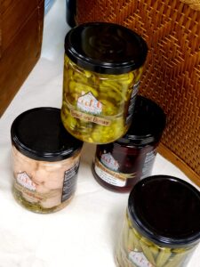 Jars of Pickle Cottage products on display.