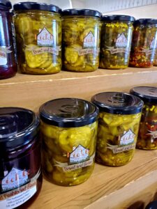 Jars of Pickle Cottage products on display.