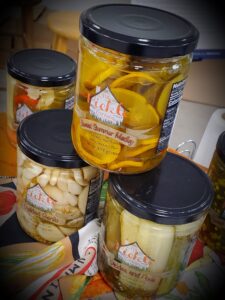 Stacked jars of Pickle Cottage products