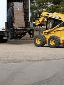 Delivering an order of 15,000 new jars to the Pickle Cottage.