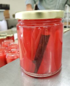 A jar of Hannah's Country Sweet Sticks during the canning process.